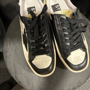 Golden Goose Black and White High-Top Sneakers